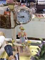Woman on Bannister clock