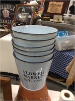 Six metal flower market buckets