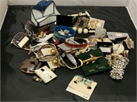 Assorted costume jewelry and more.
