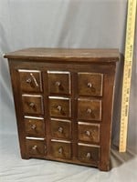 Small antique apothecary cabinet
