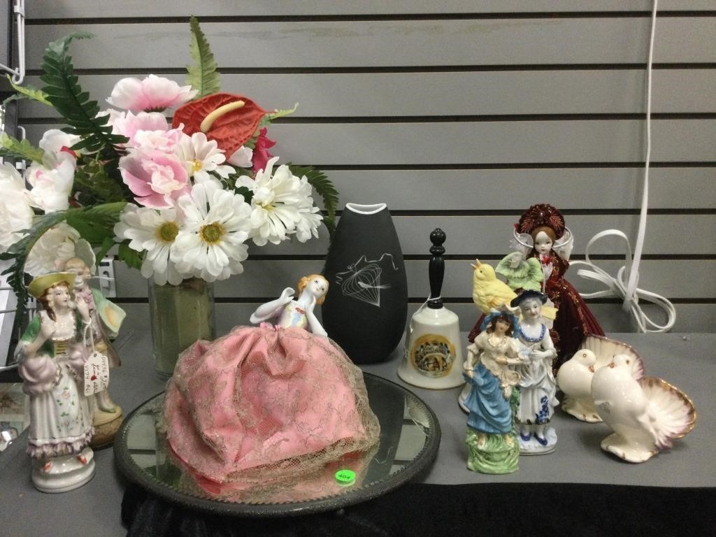 Assorted vintage figurines and more.