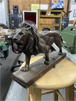lion figurine as is