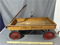 Sunday American newspaper wooden wagon