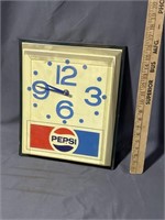 Vintage Pepsi advertising clock
