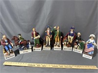 Large selection of historical figure decanters
