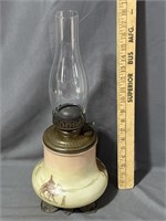 Antique kerosene lamp with camel design on the