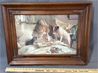 Wooden frame with print of dog, cat and little