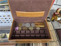 leather box w coins and cigarette lighter
