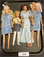 4 Vintage Barbie Dolls.