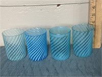 Four blue swirl striped opalescent glasses