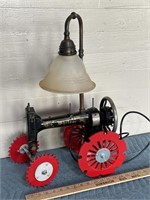 Unusual lamp made out of antique sewing machine