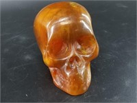 Simulated amber skull, 4"