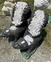 Pair of Concrete Skunk Garden Statues.