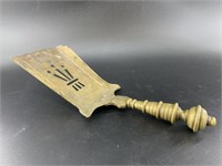 Antique British brass coal shovel taken from a coa