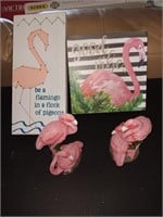 Flamingo figures and signs.