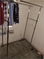 Very nice double clothes rack on wheels.