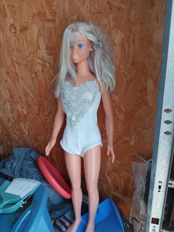 Life-size Barbie doll, 36 inches tall.