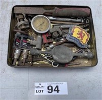 Old tin + contents.