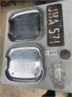 Mytton's drainage trays. Oil cans etc.