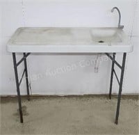 Fish Cleaning Sink, feet have rust