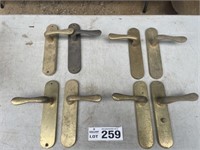 Solid brass, spring loaded handles. 4 pairs.