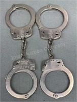 2 Pair of S&W Hand Cuffs, 1 Key For Both