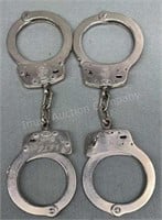 2 Sets of S&W Handcuffs, 1 key