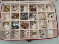Assorted jewelry in small jewelry box