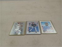 Three autographed baseball cards Darren Oliver,