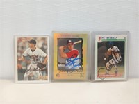 Three autographed baseball cards Mike Mussina,