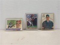 Three autographed baseball cards Frank