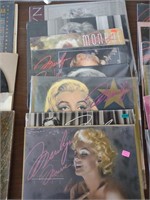 Stack of Marilyn Monroe calendars still in plastic