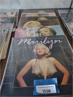 Stack of Marilyn Monroe calendar still in plastic