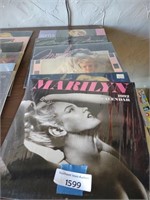 Stack of Marilyn Monroe calendar still in plastic