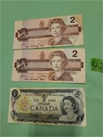 2-$2.00 bills, 1-$1.00 bill