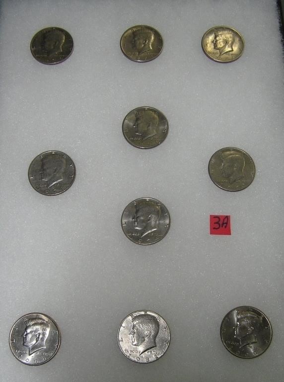 Group of Kennedy half dollar coins