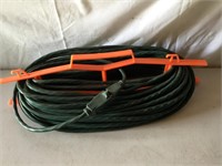 100 Foot Green Extension Cord On Cordholder