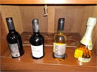 4 COLLECTABLE BOTTLES