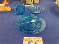 THREE VINTAGE BLUE GLASS DISHES