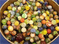 ROUND BISCUIT TIN FILLED WITH VINTAGE MARBLES