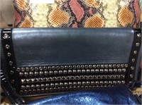 Gray studded clutch bag