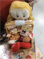 Basket of vintage Campbell Soup dolls