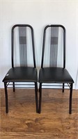 2 contemporary style armless metal chairs with
