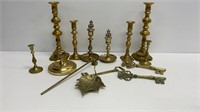 Brass colored candle holders and decor keys