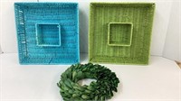 2 wicker serving baskets and greenery wreath