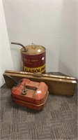 (2) metal gas cans. 6.5 gallons and gallons. With