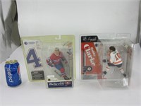 2 figurines de hockey dont Jean Beliveau