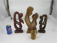 4 statues sculptées dans le bois