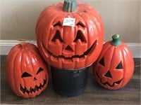 3 large pumpkin decorations, 1 is lighted