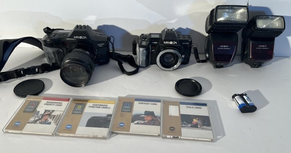 2-Minolta Cameras W/ Accessories